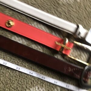 Stylish Belt Trio in White, Red, and Brown